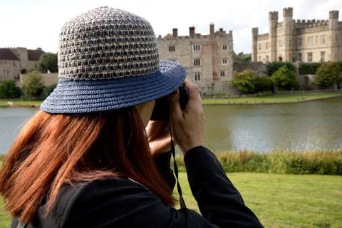 The woman is photographing the castle Stock Photos