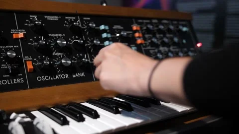 Woman In The Piano Turning Knobs Of An Old School Oscillator. closeup Stock Footage 220717667