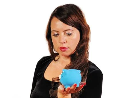 Woman with a piggy bank in her hand Stock Photos