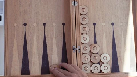 Woman playing backgammon and rolling dice. slow motion. 4K Video stock 207657329