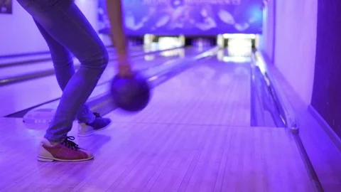 A woman is playing bowling. Throws the ball Stock Footage 80208252