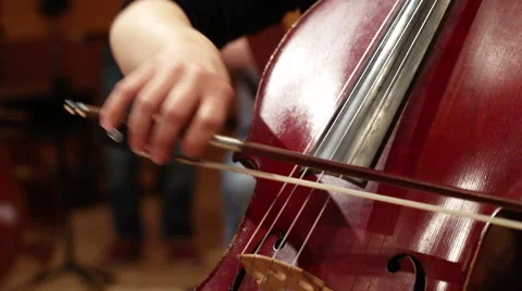 Woman playing the cello Stock Footage 45138904
