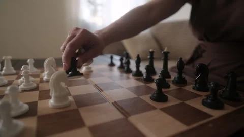 Woman Playing Chess For Black, Making Move On A Chessboard And Taking Pawn By Stock Footage 339086091