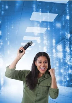 Woman playing with computer game controller with blue sparkling background Stockfoto's