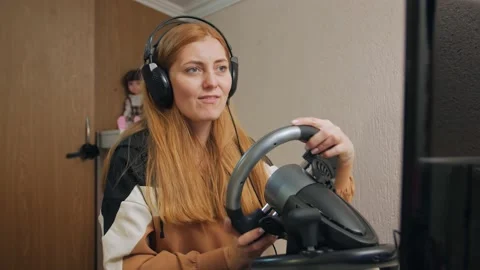 Woman Playing Computer Races Stock Footage 168402876