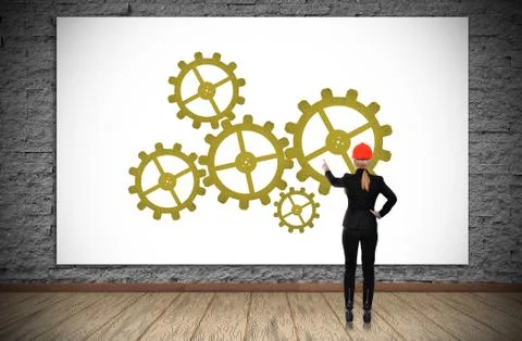 Woman pointing to cogs Illustrazione stock