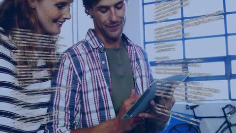 Woman pointing, man scrolling tablet, team checking tech code while code overlay Stock Footage 333552958