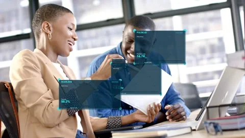 Woman pointing pen causing teal HUD stacking over paper, man leaning in Stock Footage 333936846
