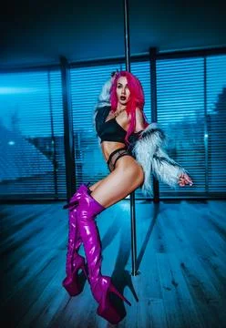 Woman pole dancing Stock Photos