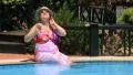 Woman by pool HD Footage