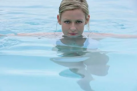 Woman in pool Stock Photos