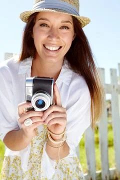 Woman portrait, photographer or vintage camera in holiday location, summer Stock Photos