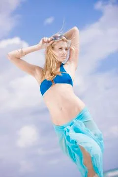 Woman posing on the beach Stock Photos
