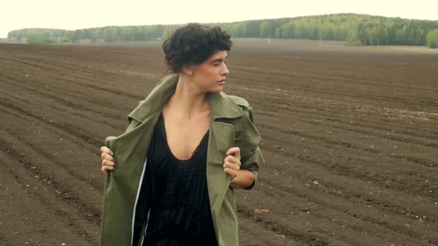 Woman posing on field Видео 76060031
