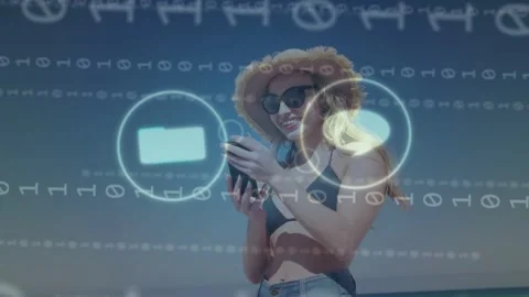 Woman posing selfie on beach, tech icons appearing and causing lowering phone, Stock Footage 334322266
