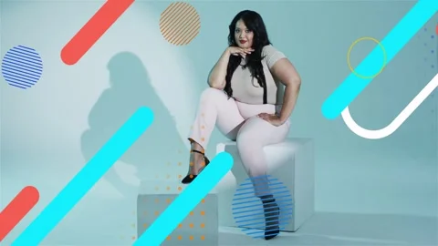 Woman posing on white cubes after cue, shifting for fashion content while Stock Footage 333154524