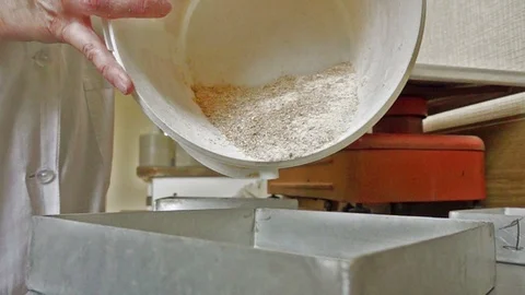 Woman pours flour Stock Footage 94758853