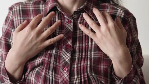 Woman practicing EFT - tapping on the collarbone point Video stock 167976621