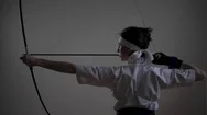 Woman Practicing Kyudo Bow Shooting Stock Footage