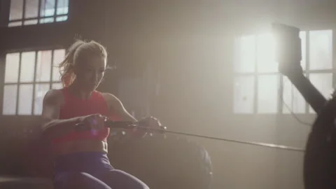 Woman practicing rowing exercise Stock Footage 236182192