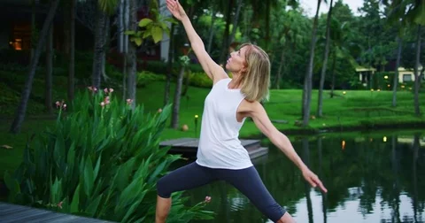 Woman Practicing Yoga Stock Footage 70252318