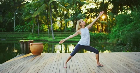Woman Practicing Yoga Stock Footage 81549157