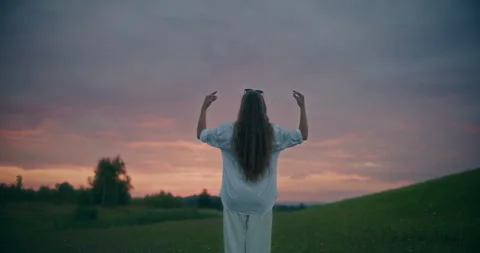 Woman Practicing Yoga While Standing In Meadow Stock Footage 250420768