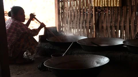 Woman prepare sweets in large bowl - Myanmar Stock Footage 61347853