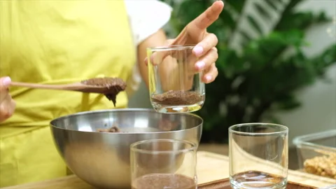 A woman prepares chia pudding in the kitchen Stock Footage 137492247