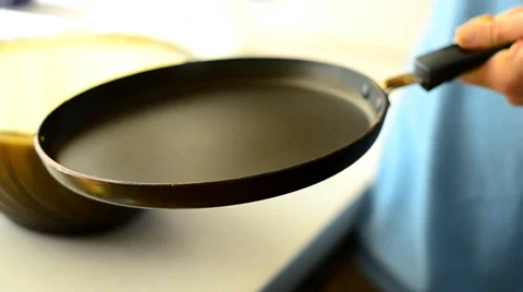 Woman prepares pancakes Stock Footage 59662174