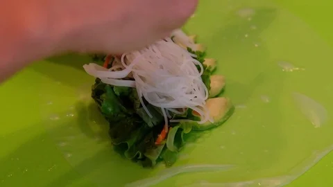 Woman Preparing Avocado Spring Roll Carrots Wrap Asian Cuisine Thai Food Korean  Stock Footage 79244183