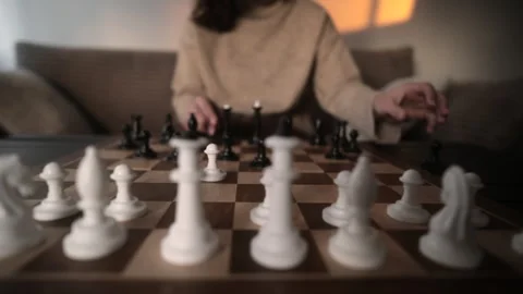 Woman Preparing For Chess Game Setting And Arranging Chess Figures Stock Footage 336287763
