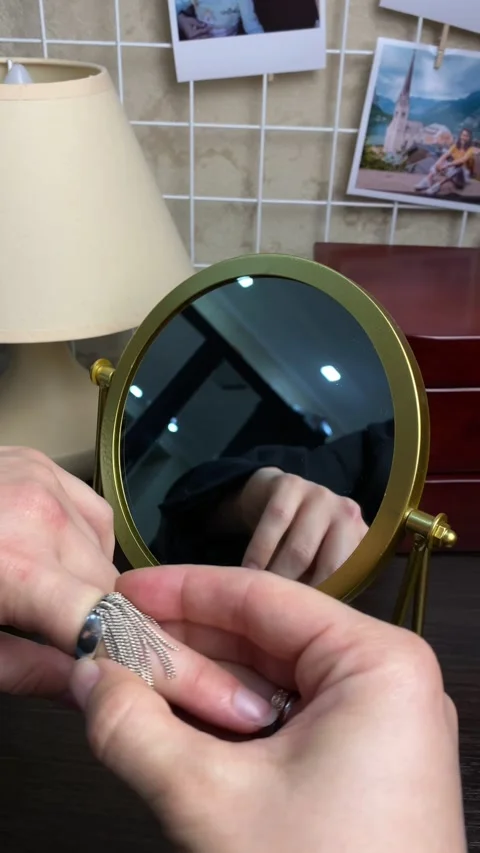 Woman preparing for date do make up put ring on her finger Stock Footage 252735803