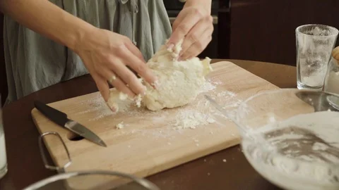 Woman preparing dough for bread Stock Footage 114805655