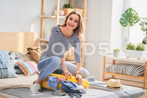 Woman preparing for the journey Stock Photos