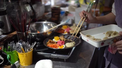 Woman preparing a meal Stock Footage 306587001