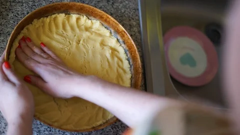 Woman is preparing a pie Stock Footage 100975982