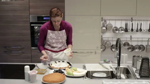 Woman preparing sponge cake Stock Footage 62792304