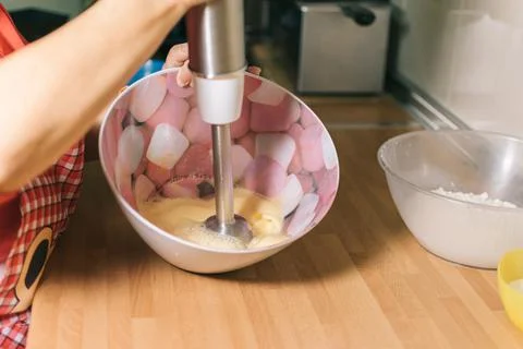 Woman preparing sponge cake. Stock Photos