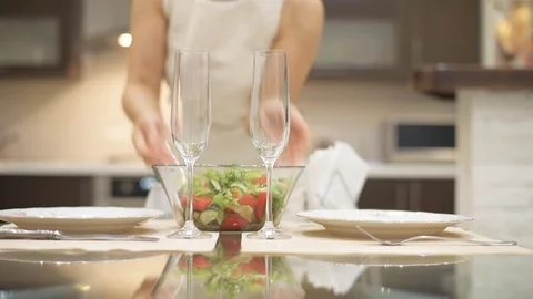 Woman preparing supper for two persons. Stock Footage 77753093