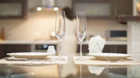 Woman preparing supper for two persons. Stock Footage 77753199