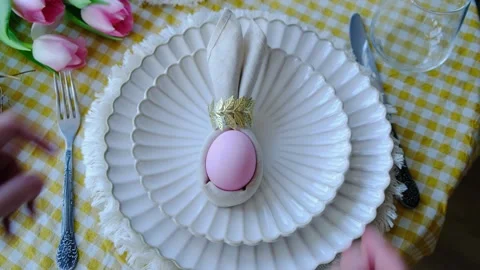 Woman preparing table for Easter. Stock Footage 332702039