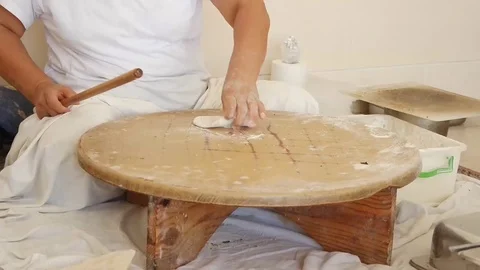 Woman preparing a traditional Turkish tortilla Stock Footage
