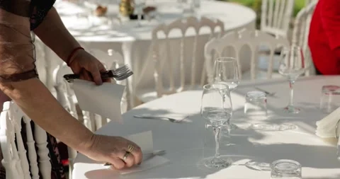 A Woman is Preparing the Wedding Dining Table - Close Up Stock Footage 263284945