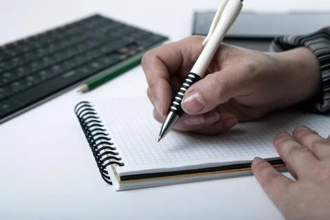 Woman is preparing for written work Stock-Fotos
