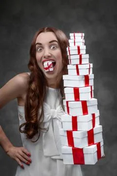 Woman with present boxes Stock Photos