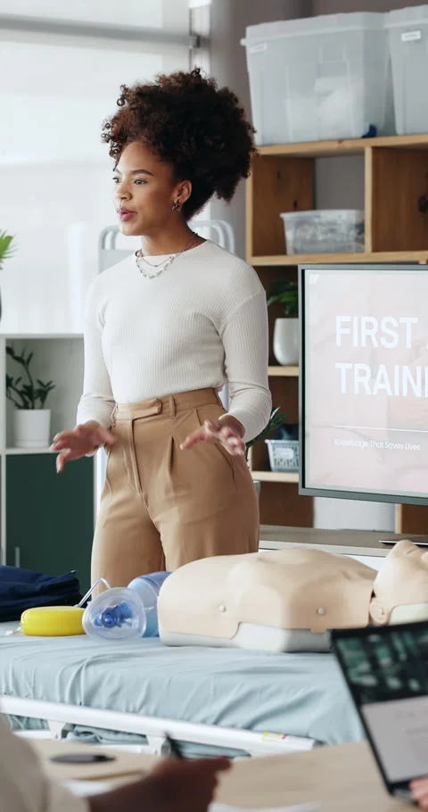 Woman, presentation and training with screen with first aid, teaching or course Stock Footage 333167663
