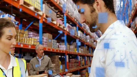 Woman presenting barcode in warehouse, man scanning with PDA, blue data overlay 스톡 동영상 333837154
