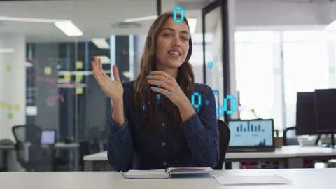 Woman presenting data in office, binary overlay appearing and highlighting Stock Footage 330188521