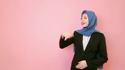 Woman presenting posture with thumb up Stock Footage